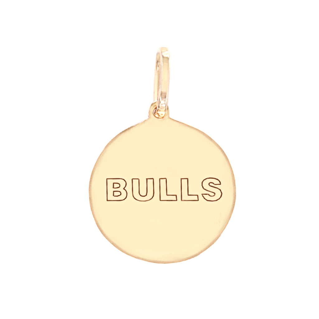 gold round pendant engraved with Chicago bulls