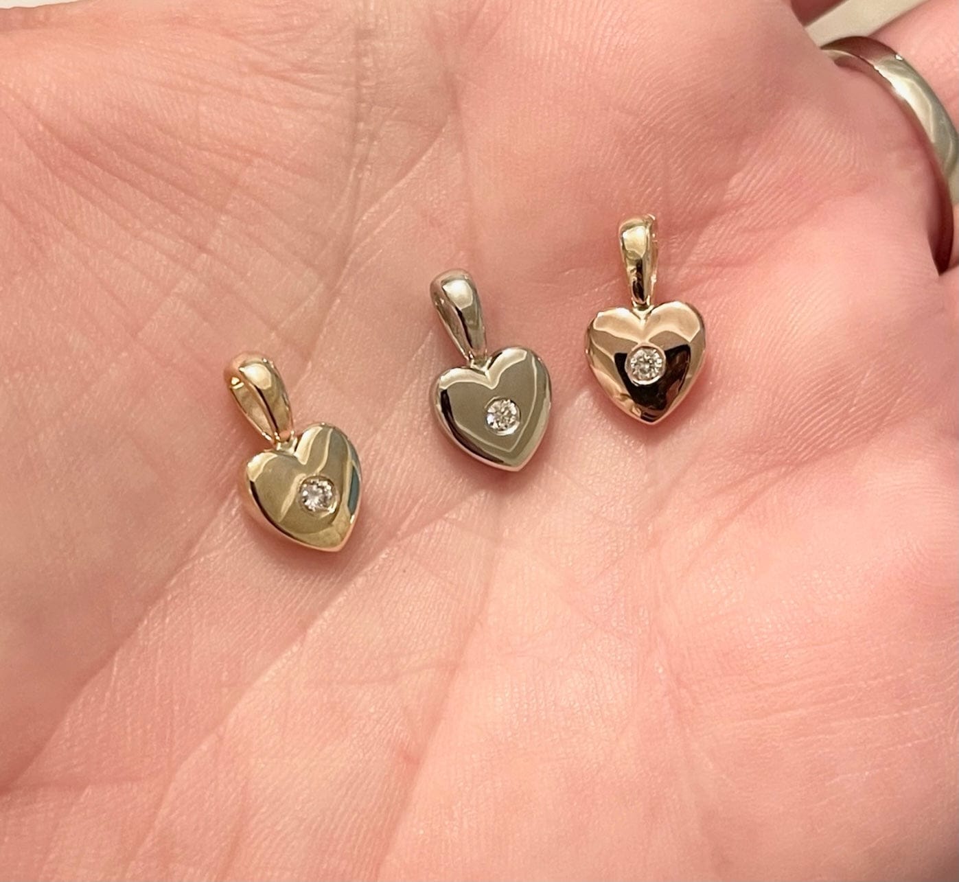 yellow gold heart shaped charm